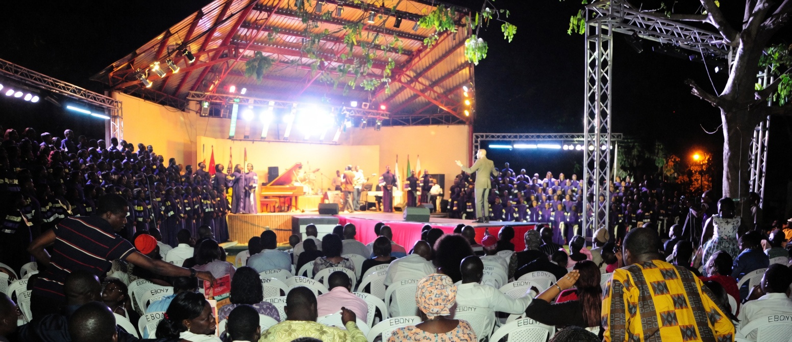 Aerial view of Awesome Praise 5 at Freedom Park Lagos, 11 November 2011 — the lit stage, packed audience, and Lagos skyline at night